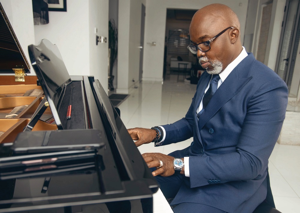 Amaju Pinnick playing piano