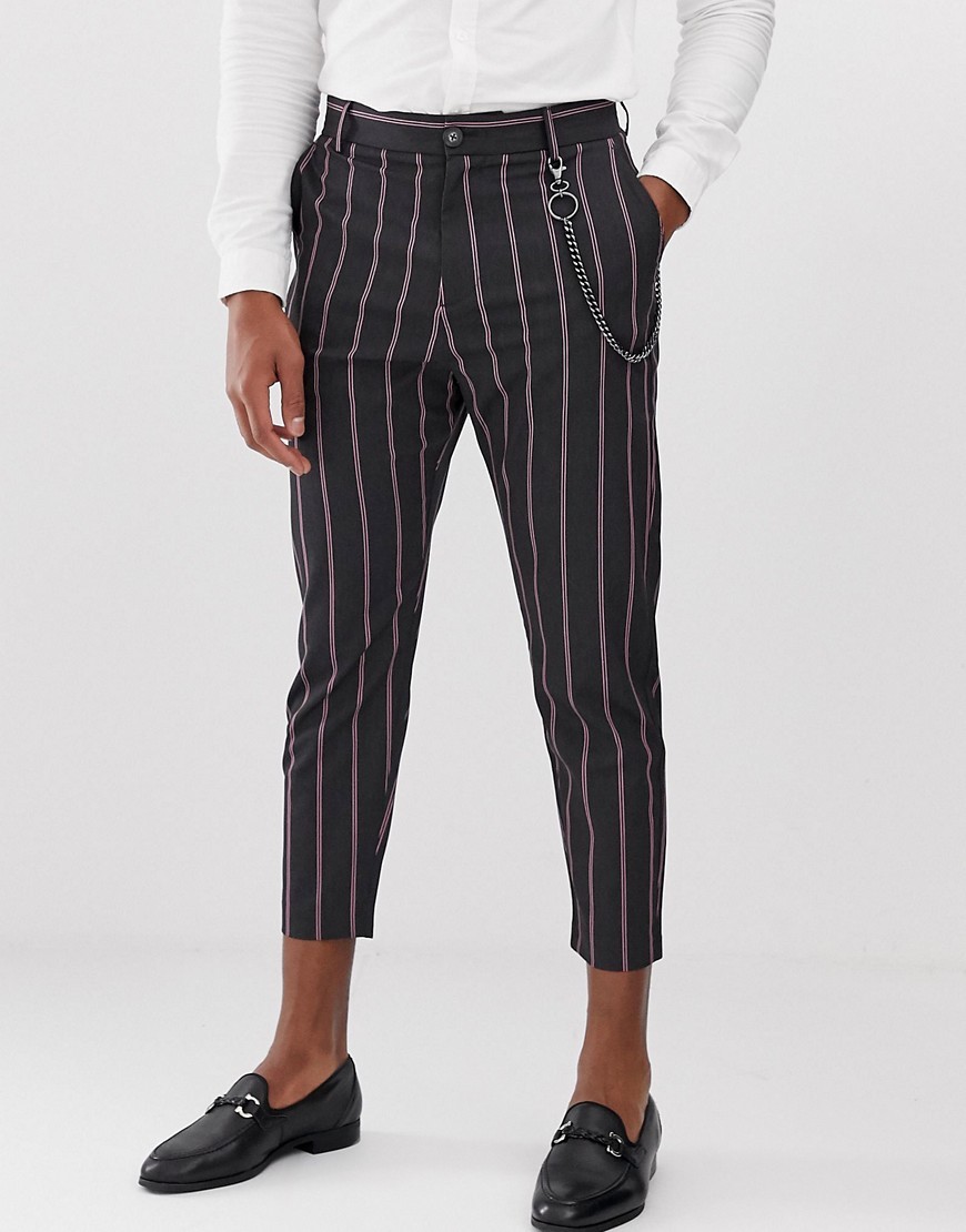 carrot fit trousers in black with pink stripes