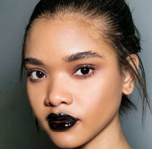 Far from being just a bold fashion statement, black lip liner and lipstick offer versatility and intensity.