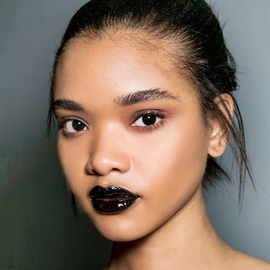Far from being just a bold fashion statement, black lip liner and lipstick offer versatility and intensity.
