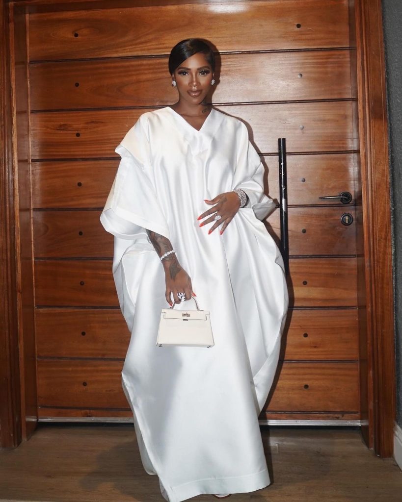 Tiwa Savage takes on the all-white trend with her luxurious agbada.