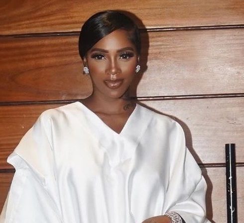Tiwa Savage takes on the all-white trend with her luxurious agbada.
