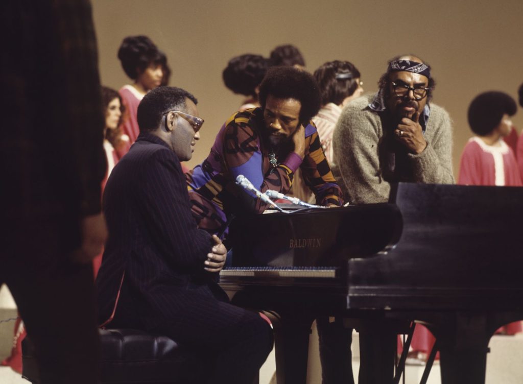 Ray Charles Confers With Jones on Stage pictures by David Redfern-Redferns-Getty Images